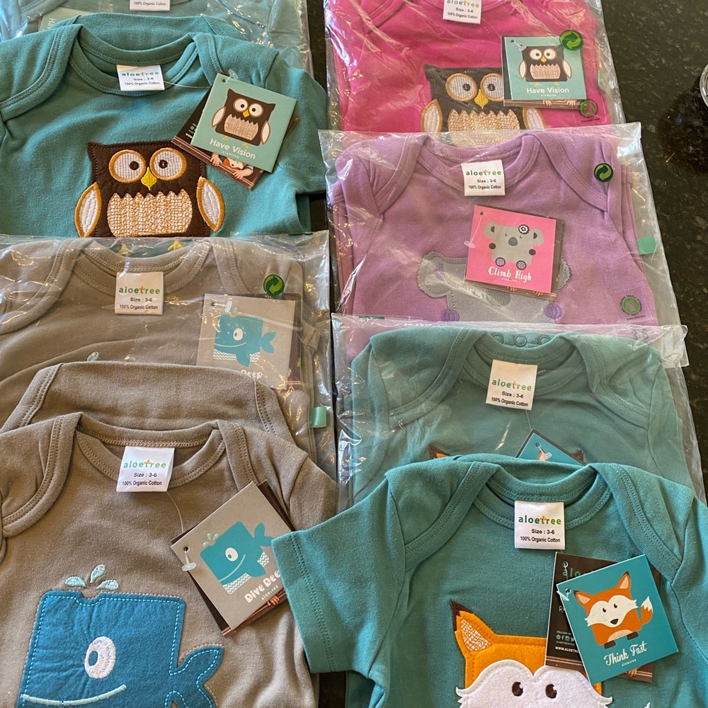 Total of 20 NWT Baby 3-6mo and 0-3mo ORGANIC cotton onsie-type body suits.